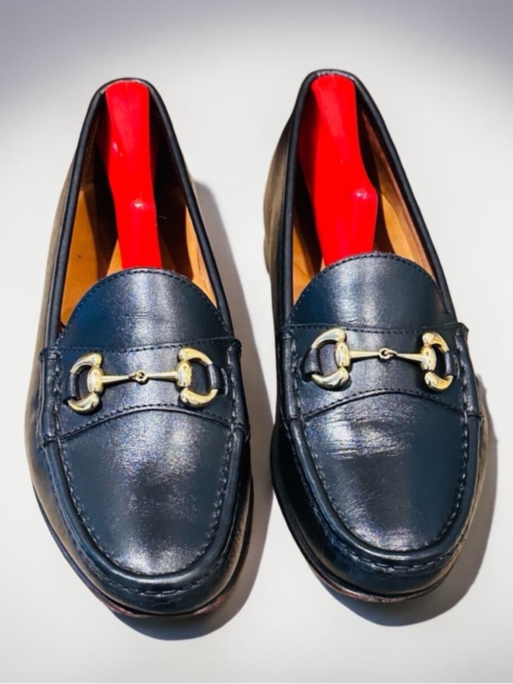 Jay Butler’s Horse Bit Black Leather Loafers with Gold Buckle.